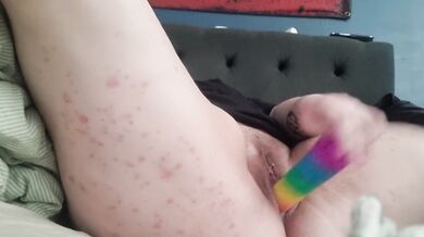 She squirts then shoves rainbow dildo deep in Swedish teen solo