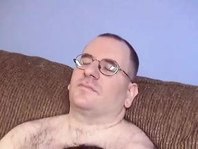 Blonde slut sucks ugly dude's cock while brunette licks his balls