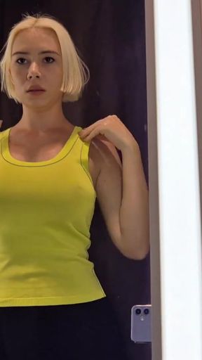 Iconic moment from &quot;Seduction in a fitting room of a shopping mall. Trying on transparent clothes in a fitting room.&quot;