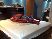 carnage has fun with spiderman dummy