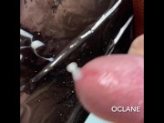 man puts out rich and stinky sperm on a black board