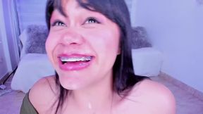 Lila Jordan eats a juicy hamburger while performing an ASMR-style act.