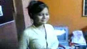 Kinky dark skinned ordinary looking Hindu brunette flashes her titties