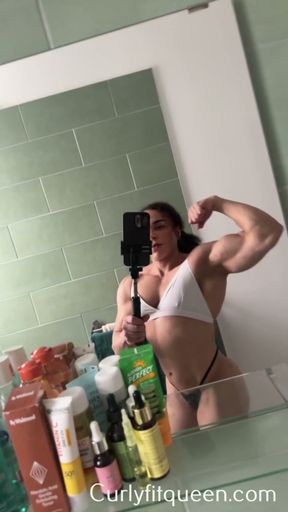 After flexing, the stiff ass of an ebony milf trembles.