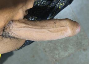 A lonely boy playing with his at night