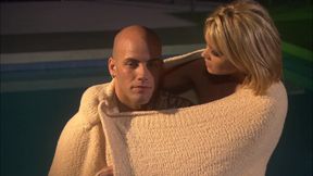 Blonde Milf sucks a cock near the pool at night