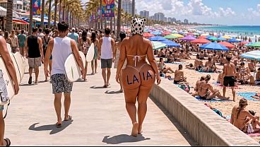 Busty babe's beach blowup becomes wild romp