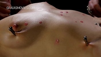 Young maiden body covered in candle wax