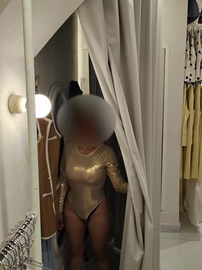 Bodysuit-clad babe reveals erect nipples in dressing room