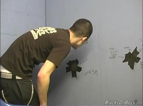Milky teenager gargling Off dark lollipops At Gloryhole