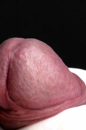 Glans Game with White Latex Gloves in Super-closeup