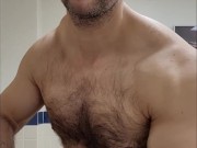 Muscle bear flexing biceps!