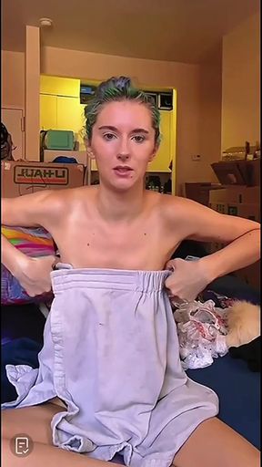 Embarrassing nipslip accident for a cute blonde standing alone