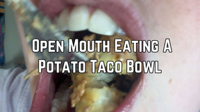 Up Close Open Mouth Eating A Potato Taco Bowl
