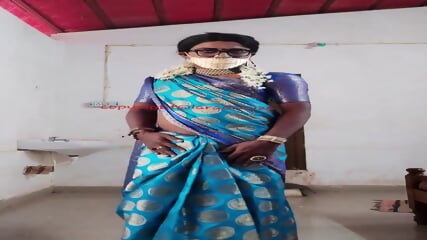 Indian beautiful crossdresser model in blue saree