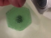 Almost Caught in action at the urinal Pinching off/on Janitor saw wet floor