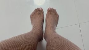 CATH WEARING EYE-CATCHING PINK FISHNET NYLON STOCKINGS