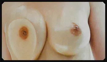 Anne poses with her wet t short before pulling her tits out