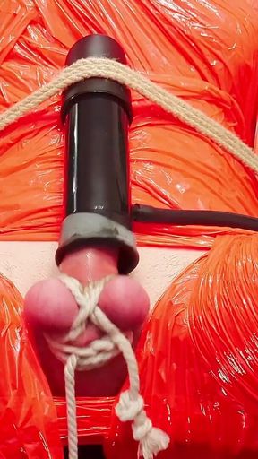 Merciless Cock Milking (tight Shiny Red Plastic Mummificaton and Remote Anal Stimulation)