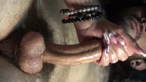 close up to a big hairy bush making him a handjob finishing in my long nails and sucking the cum from the pubic hair