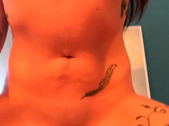 Brunette seductress working her big boobs and hot ass