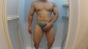 Twink jock’s bulging cock explodes in gym shower session