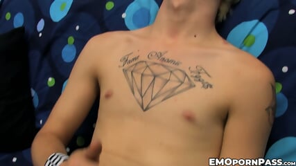 Blond Austin Mitchell jerks off massive cock before blowing off cum