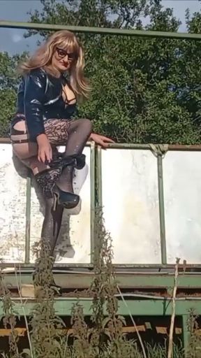 Crossdresser Playing Down on the Farm in PVC   Clip 3
