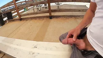 Muscular bear jerks off and cums at public park bench