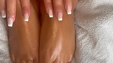 Oily solo foot play