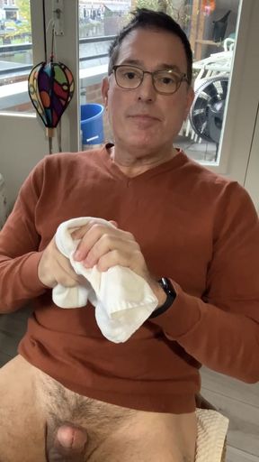 Jerking off and cumming in my orange sweater