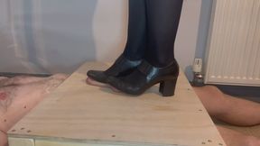 Old work heels flatten his vunerable testicle!