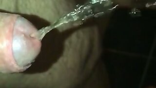 Fat guy with a small limp dick peeing in Sletten mo
