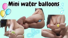 Playing with mini water balloons