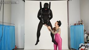 Zentai Suspension With Mid-Air Handjob and Anal Play!