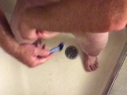 I was so hard while shaving in the shower, started to masturbate and used the water jet to cum