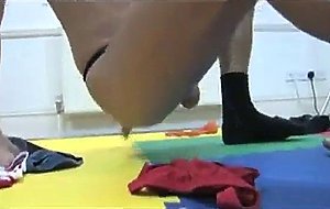 Two older men in thongs