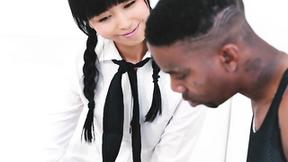 ”Japanese tutor tries to tame a ebony anaconda”