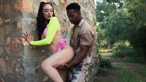 Sexually attractive brunette Catherine Knight pleasures cocky black stud outdoors