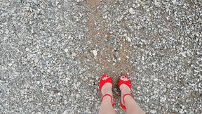 Walking on Pebble Beach through the water wearing my 6inch Wedges.
