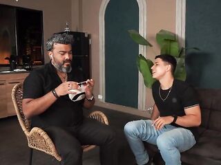 Busty Stepmother Plays with Her Stepson's Shlong While Her Husband Plays on His Game Console