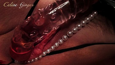 Orgasm from a glass dildo. Close up.