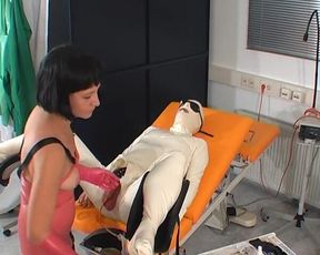 Rubbernurse Playing with Her Slave