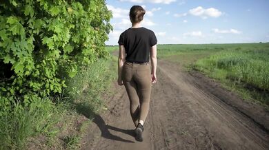 Sexy Milf Walks Outdoors And Teases Cute Panty Lines