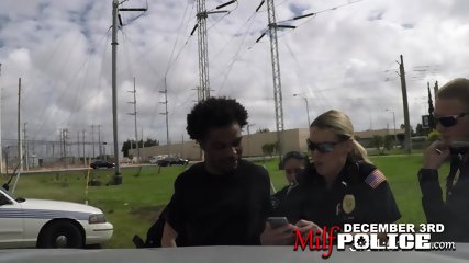 Peeping tom is chased through field and caught by perverted milf cops