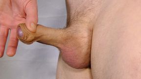 Soft cock close up wanking playing with uncut foreskin becoming semi-erect