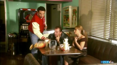 Dark-haired woman in stockings and heels takes on multiple men during her shift