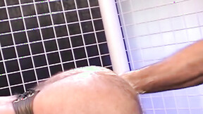 Hunky homosexual in his jockstrap endures having his booty fist ravaged by his budd