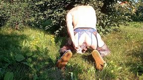 I train the anus on the grass with a huge plug