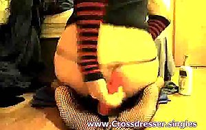 Crossdresser fucks vibrator